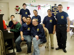 Junior Members of the Corps gathered in uniform at a holiday event